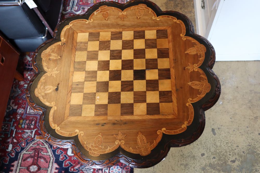 A Victorian carved walnut chess table, 60cm diameter, height 72cm